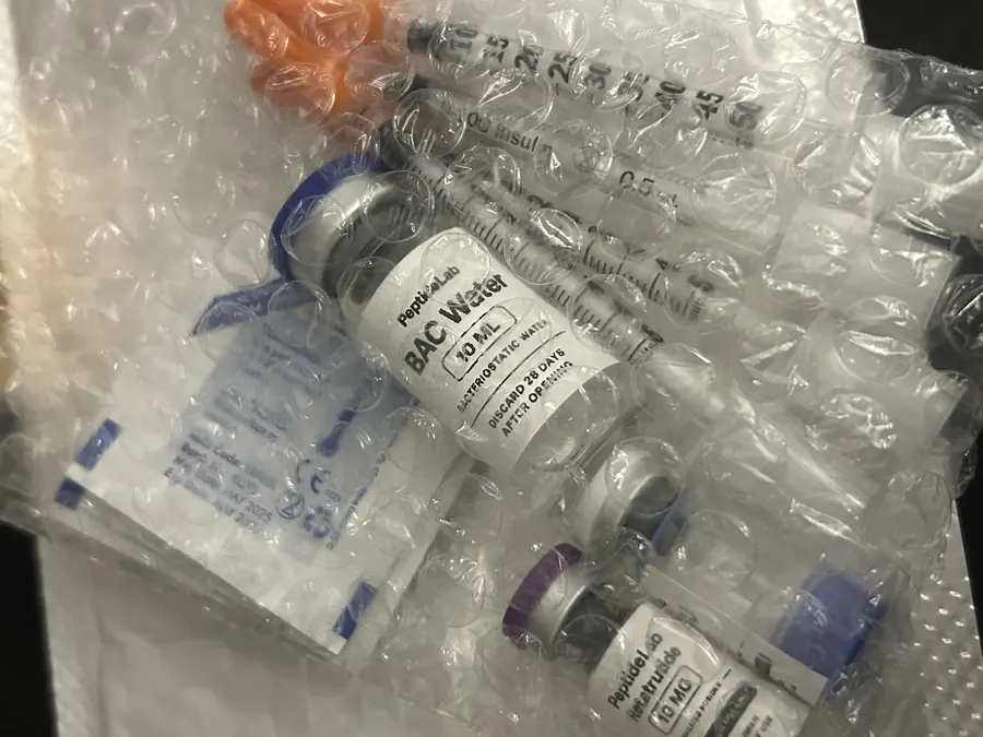 Zahra J.'s PeptideLab order containing Retatrutide, GHK-Cu and a researcher kit in protective packaging